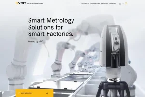 Die Website der VMT Industrievermessung, die ein Messgerät vor Robotern in einer Fabrik zeigt