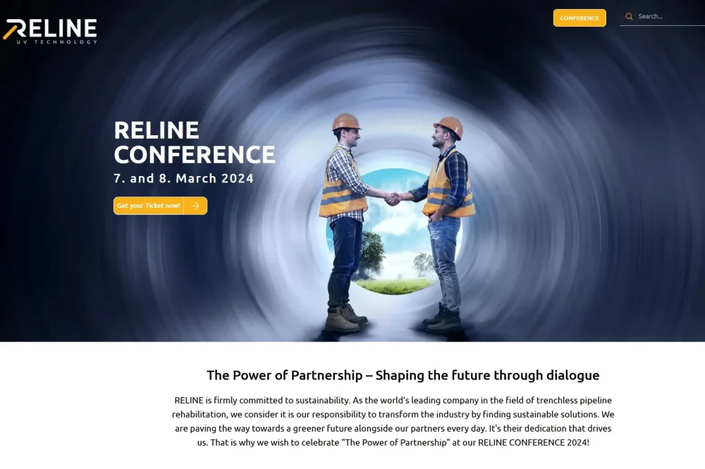 Textagentur MINDING GAPS Referenz RelineEurope Die Website von RELINE, zu sehen sind zwei Bauarbeiter, die sich in einem großen Rohr die Hände schütteln